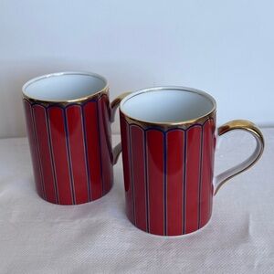 Porcelain coffee mugs with striped pattern and gold trim by Fitz and Floyd